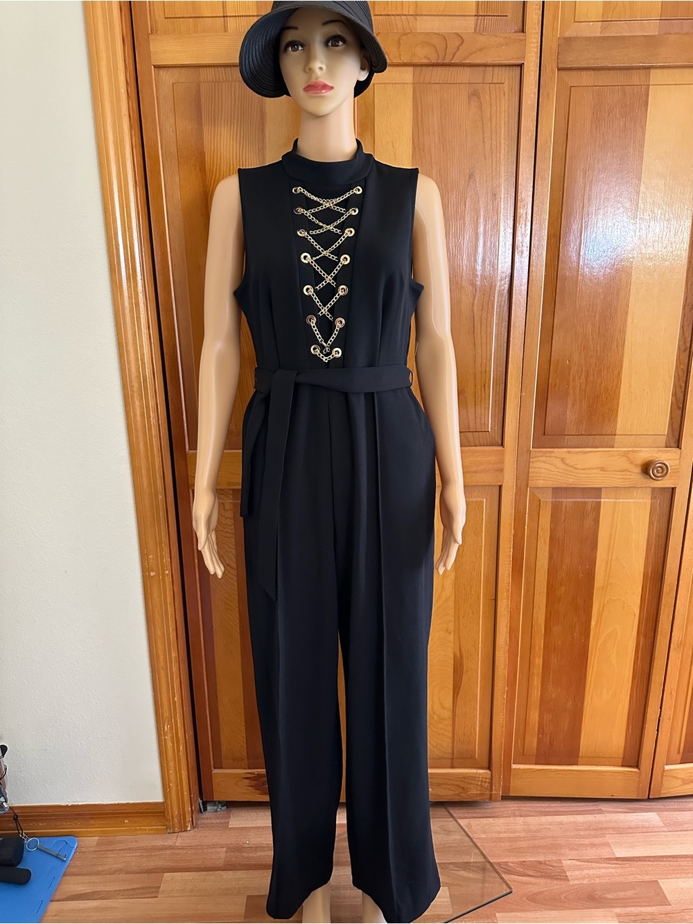 BOLD elements Black Sleeveless Jumpsuit with Gold Lace-Up Accent